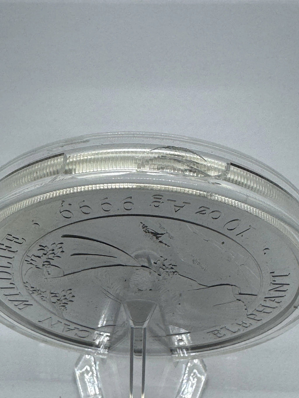 2023 Somalia 10 oz Silver African Wildlife Elephant BU Broken Capsule As Is